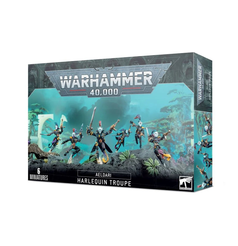 The Warhammer 40k: Aeldari Harlequin Troupe box displays six painted miniatures in action poses on scenic terrain. This plastic kit includes 6 Harlequins and a transfer sheet.