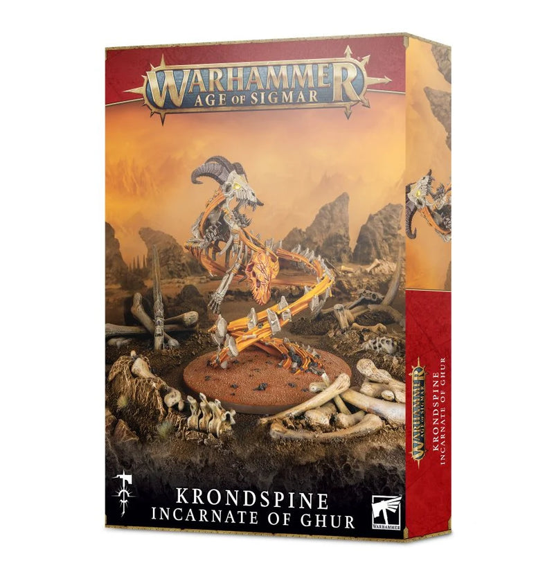 Age of Sigmar: Krondspine Incarnate of Ghur comes in a box showcasing a skeletal, dragon-like creature posed on a rocky base with a fiery sky backdrop. The packaging displays official product branding. Ideal for miniature assembly, this model is intended for use with Citadel Plastic Glue and Citadel Colour paints.