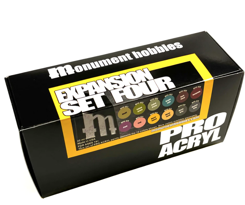 The Monument Hobbies Pro Acryl Paint: Expansion Set #4 – 12 Colors comes in a black box with bold white and yellow text, displaying all 12 new 22ml paint colors on the front.