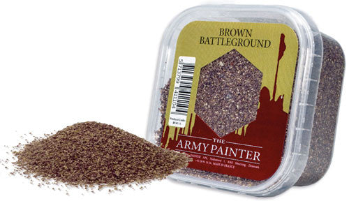 A 150ml Army Painter: Brown Battleground container holds brown basing material. Some is poured out next to the labeled tub.