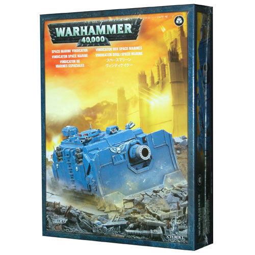 Box of Warhammer 40k: Space Marine - Vindicator model kit by Games Workshop, featuring a painted blue tank displayed in a ruined city setting, with multilingual text on the packaging.
