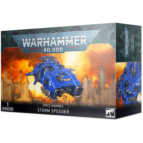 The Warhammer 40k: Space Marines - Storm Speeder kit features dynamic box art of a blue vehicle soaring over a blazing battlefield—ideal for Warhammer miniature collectors.