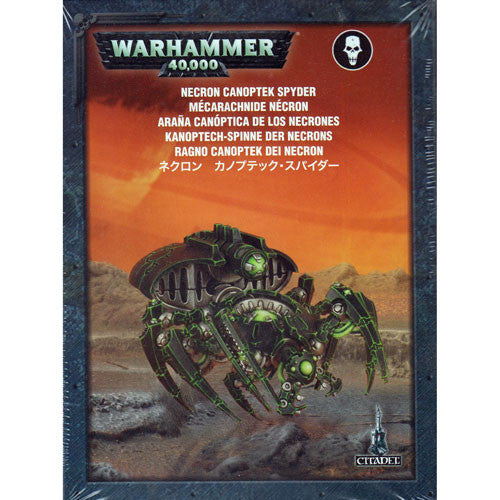 Box art for Warhammer 40k: Necron Canoptek Spyder shows a mechanical spider-like robot with glowing green parts in a rocky desert.