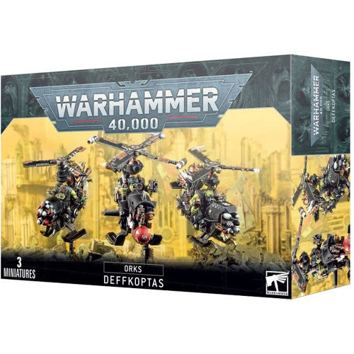 Warhammer 40k: Orks - Deffkoptas includes three assembled and painted Orks Deffkoptas flying over a ruined cityscape with a yellow backdrop. Produced by Games Workshop.