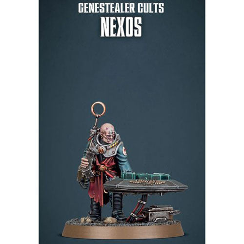 A painted miniature of a bald character in futuristic robes stands beside a round table adorned with maps and devices. The text above, "Warhammer 40k: Genestealer Cults - Nexos," appears on a blue background, highlighting one of Games Workshop’s highly detailed plastic miniatures for fans of the Warhammer 40,000 universe.