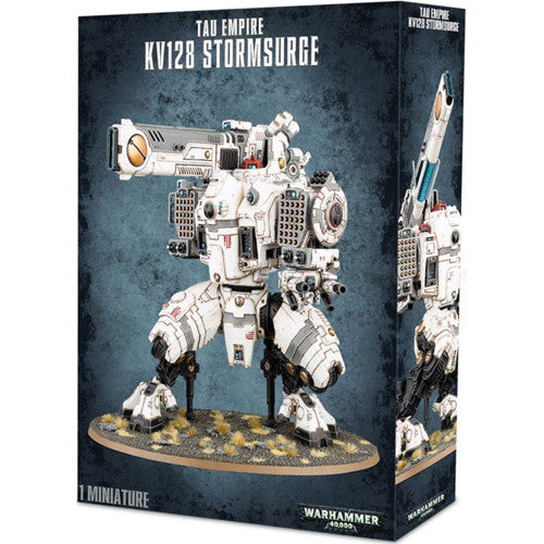 Warhammer 40k: Tau Empire KV128 Stormsurge plastic kit, fully assembled and painted in white with blue and red accents, displayed on a textured base.