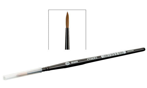 A thin, pointed Citadel Medium Shade Brush by Games Workshop with a black handle, synthetic sable bristles, and a clear plastic cap. An inset displays a close-up of the brush tip.