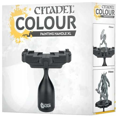 The image displays a Citadel Colour Painting Handle XL box with a black miniature painting handle. Product images and examples of models held by the handle are shown on the right side of the packaging.