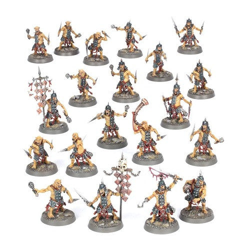 A group of Warhammer Age of Sigmar: Orruk Warclans - Hobgrot Slittaz miniatures, armed and armored, stand on textured bases in neat rows, ready for battle.