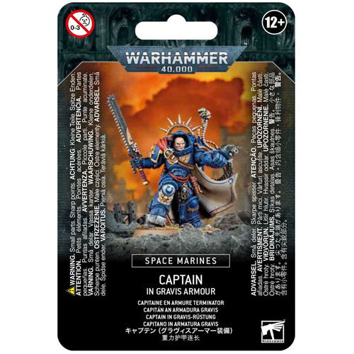 The Warhammer 40k: Space Marines - Captain in Gravis Armour box from Games Workshop displays the painted miniature in detailed armor, with safety warnings and age recommendations along the edges.