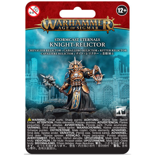 A packaged Warhammer Age of Sigmar: Stormcast Eternals - Knight Relictor mini figure stands in detailed armor, holding a staff. The packaging features product warnings and age 12+ information, emphasizing its status among the Stormcast Eternals.