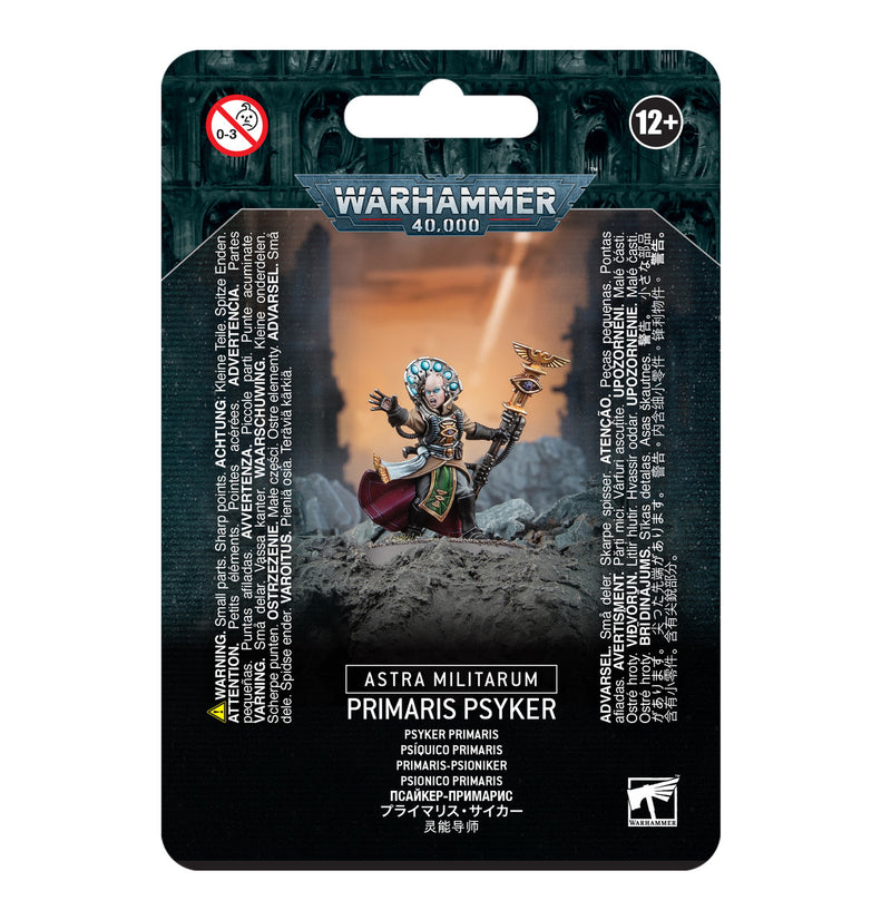 Warhammer 40k: Astra Militarum Primaris Psyker packaged on a Citadel 32mm Round Base, casting lightning with staff. Includes Games Workshop product info and warnings on packaging.